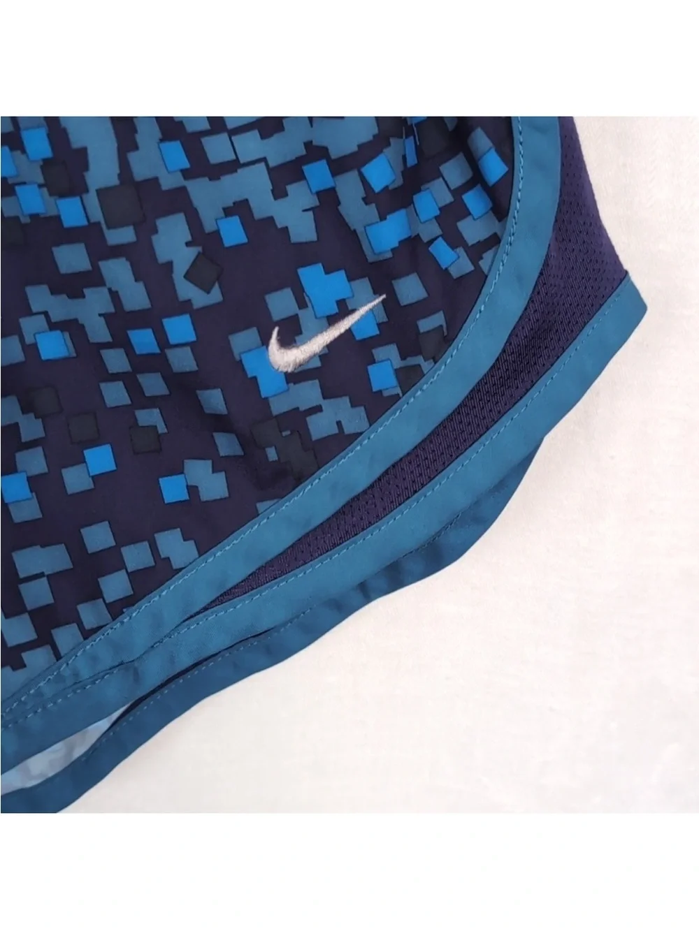 Nike Women's Navy and Bright Blue Pixel-Print Athletic Shorts